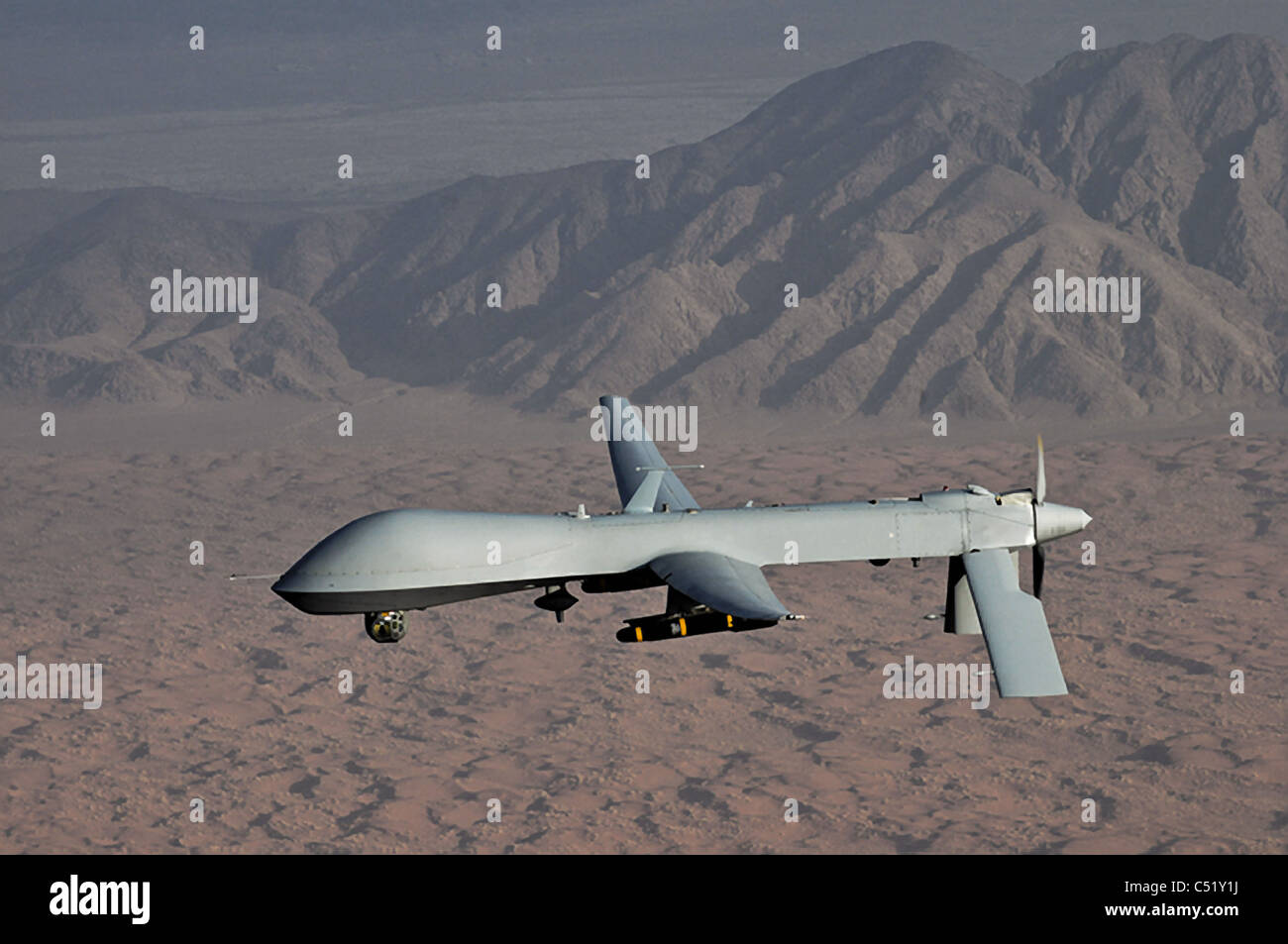 MQ-1 Predator unmanned aircraft in action over Afghanistan. Stock Photo