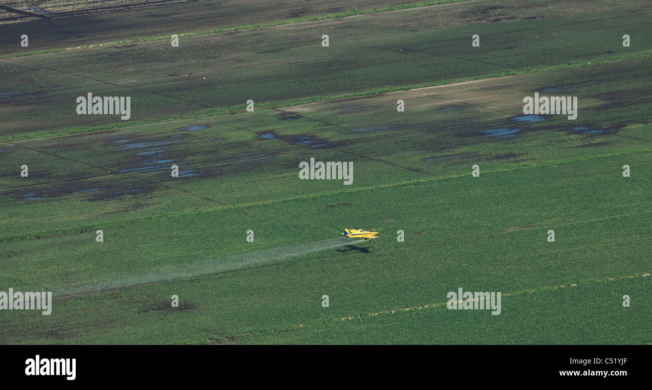 crop duster airplane spraying Agricultural Area Stock Photo Alamy