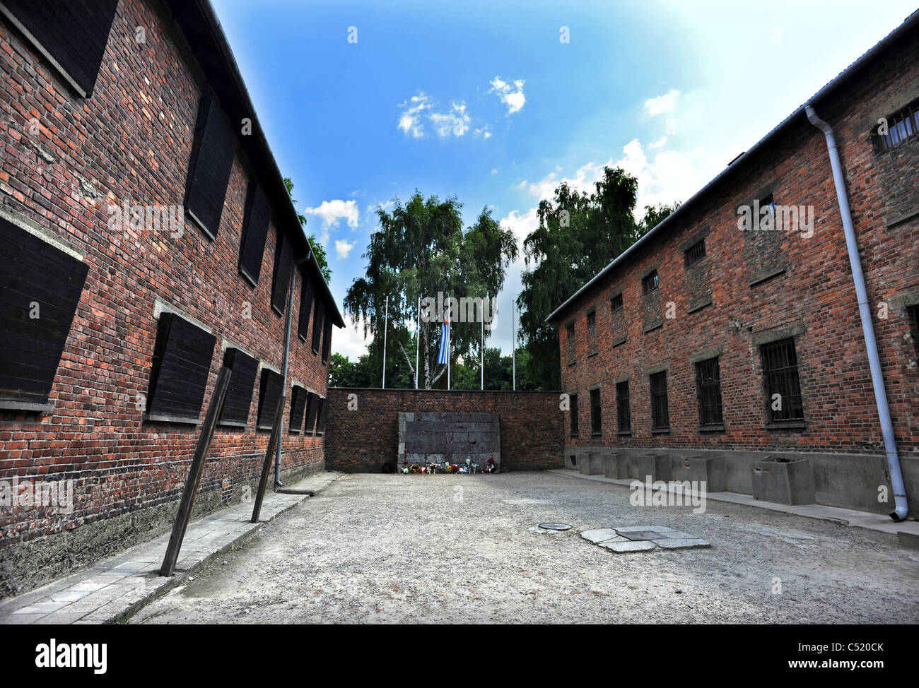 Auschwitz 1 former concentration camp and now a State Museum - Courtyard with the infamous death wall where prisoners were shot Stock Photo