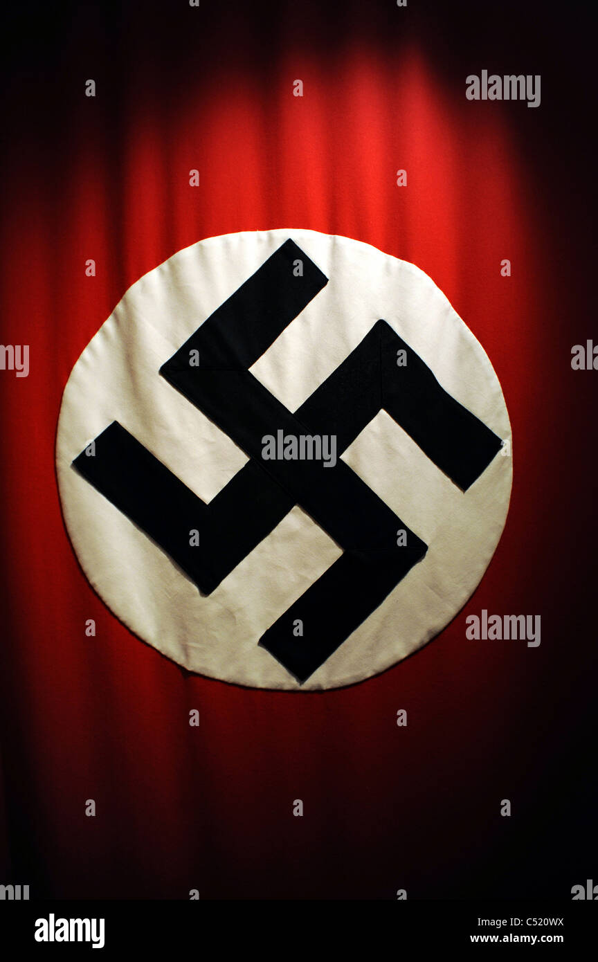 An original Nazi Flag of the German Third Reich hangs Stock Photo