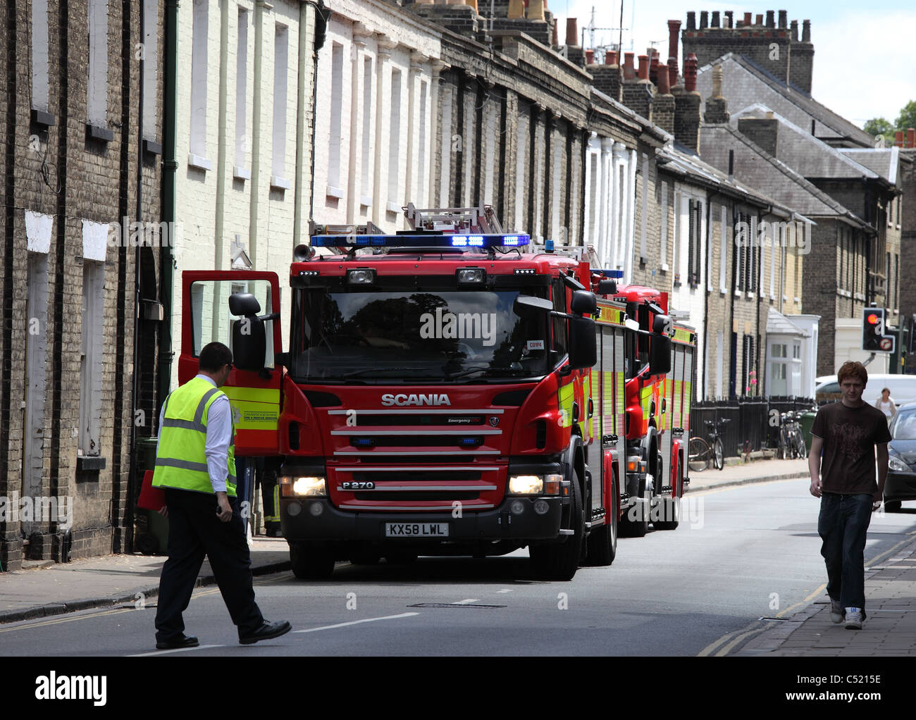 Two fire engines at an incident Cambridge Cambridgeshire Stock Photo
