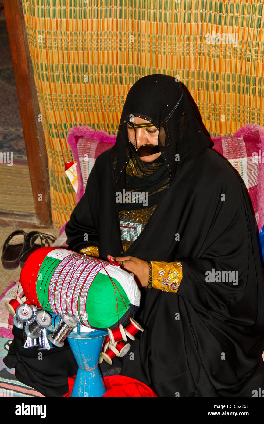 Muslim women in traditional dress demonstrate their activities in the home at the Heritage Center in Fujairah, UAE Stock Photo - Alamy Muslim women in traditional dress demonstrate their activities in the home at the Heritage Center in Fujairah, UAE Stock Photo - Alamy