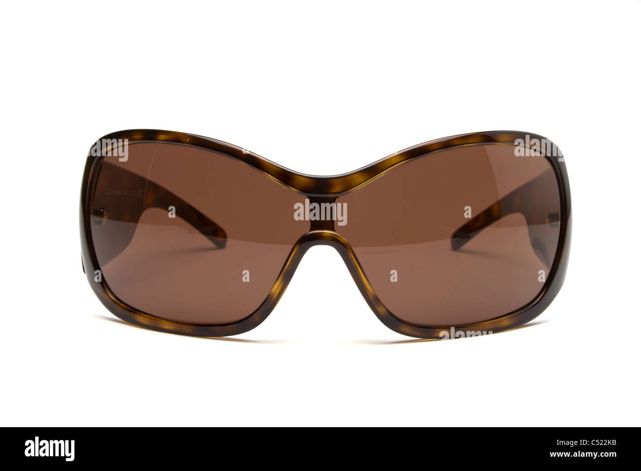 Designer Sunglasses in brown isolated on white from low perspective. Stock Photo