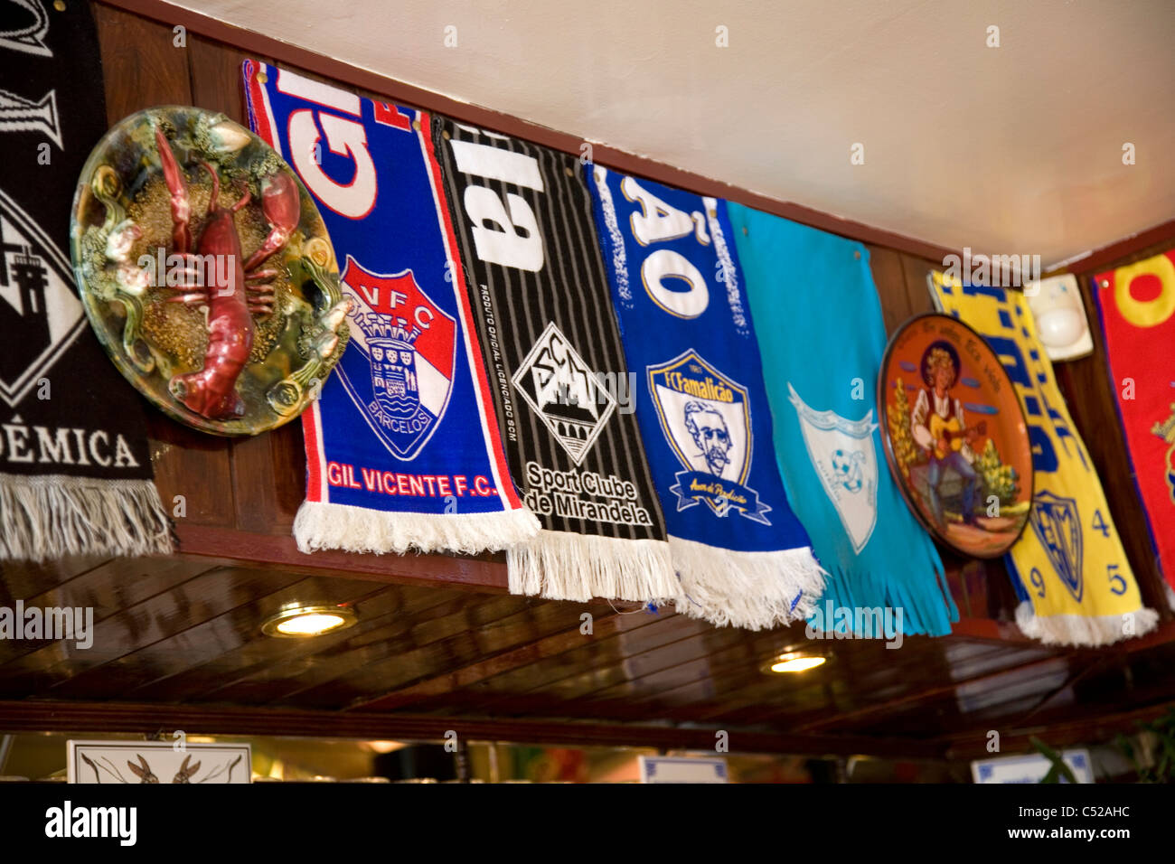 Portuguese Football Scarves above Bar Counter Stock Photo