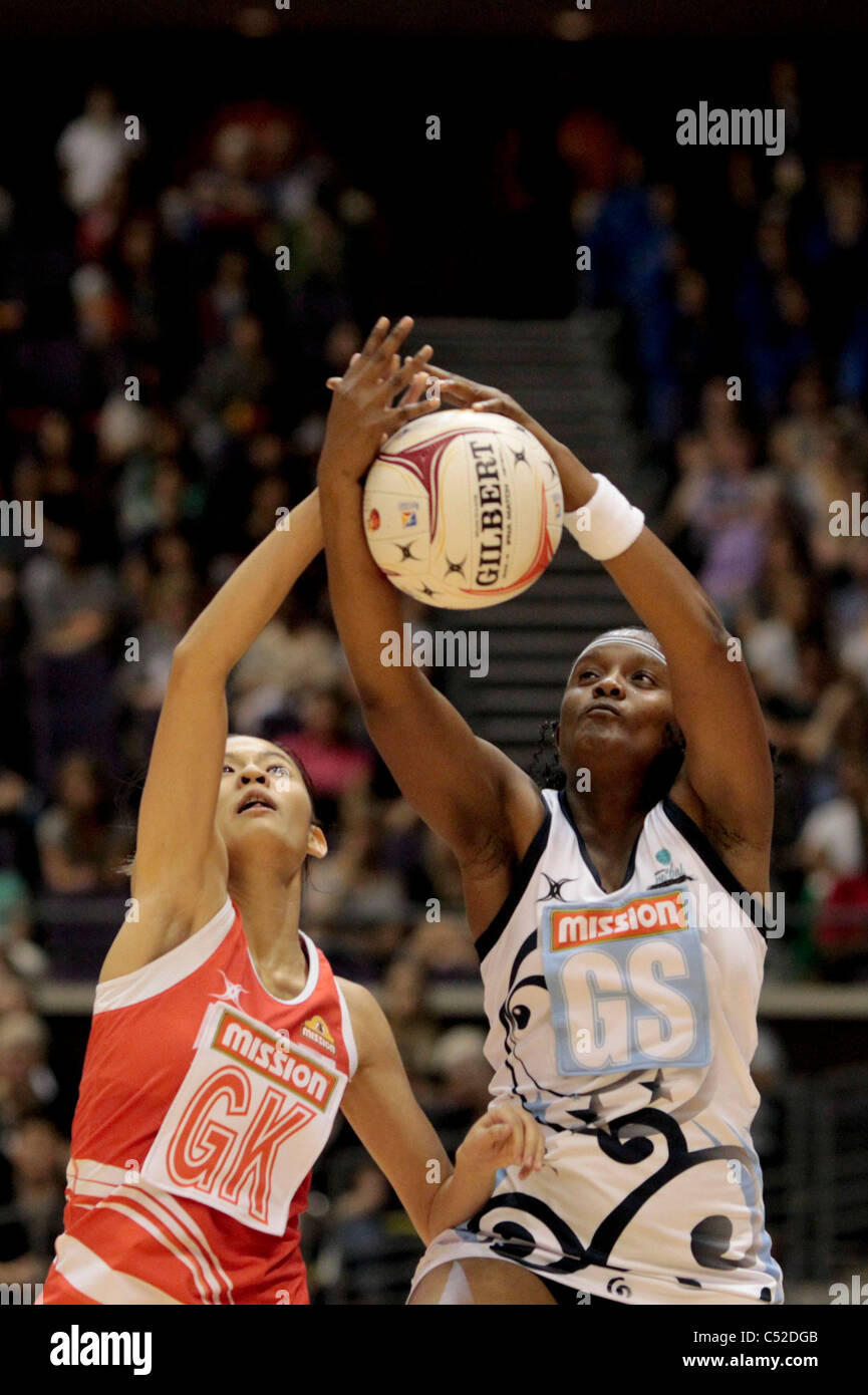 Tebogo Radipotsane of Botswana(right) and Lin Qingyi battle for the ball during the Pool C match between Botswana and Singapore Stock Photo
