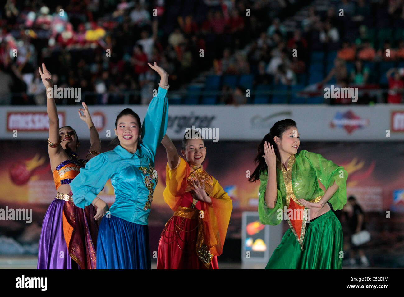 Performers in traditional costumes during the Opening Ceremony Stock Photo