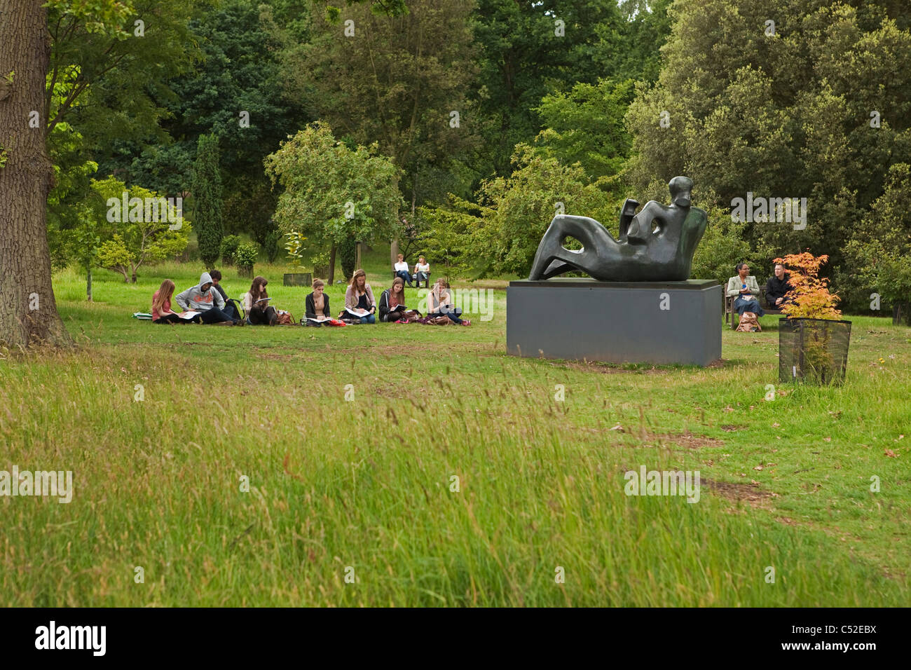 Young art students drawing inspiration from Henry Moore Stock Photo Alamy