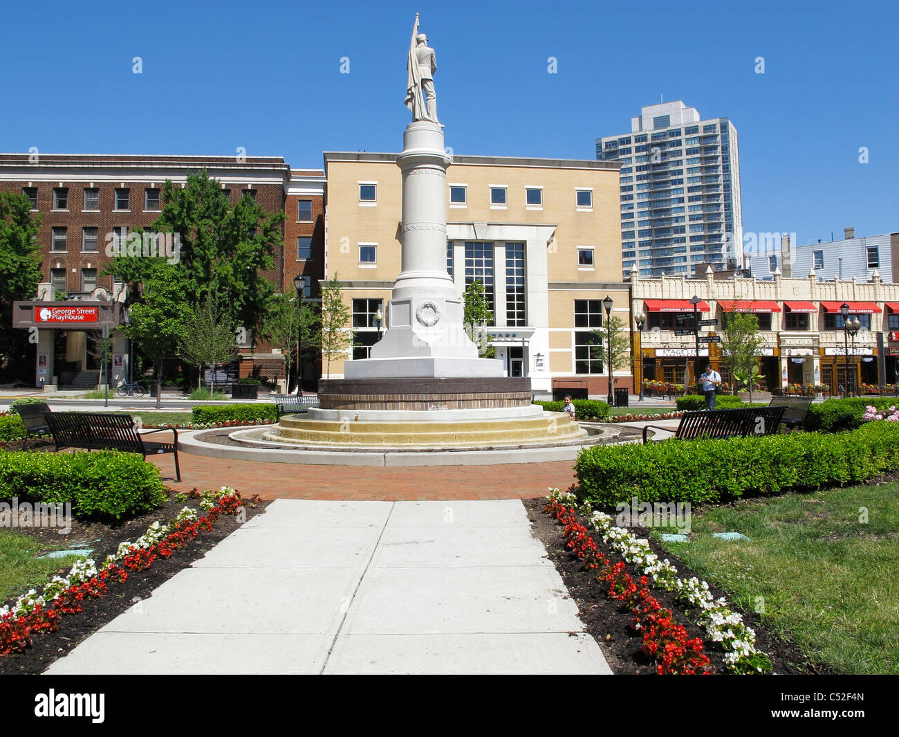Memorial statue and theaters in downtown New Brunswick, NJ Stock Photo