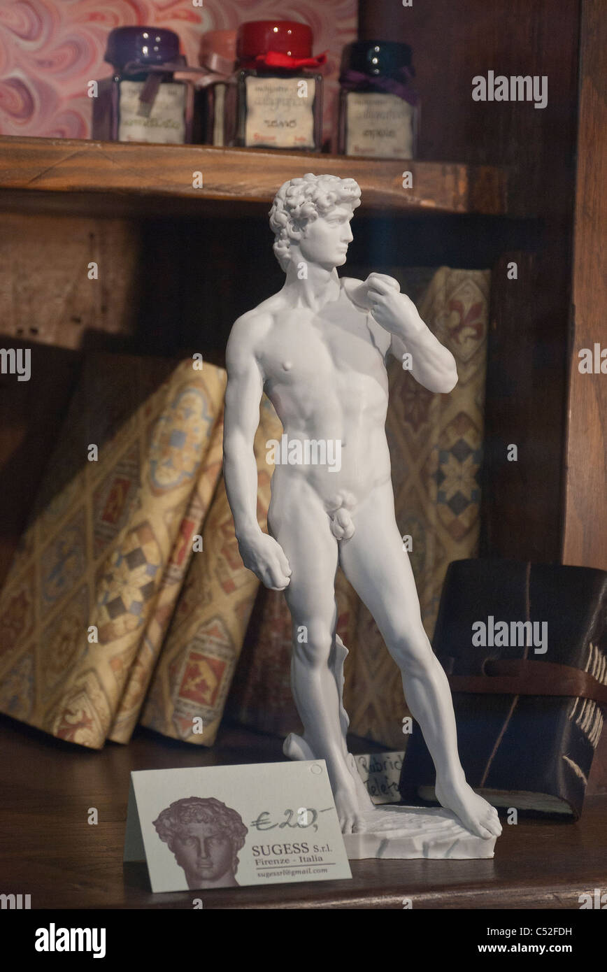 Humorous miniature statue of Michelangelo's David in store window for sale for 20 Euros in Florence, Italy. Stock Photo