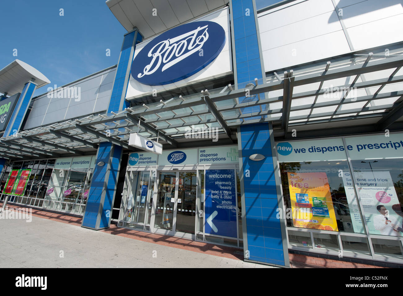 The storefront of the pharmacy Boots on a retail park, Manchester.  (Editorial use only Stock Photo - Alamy