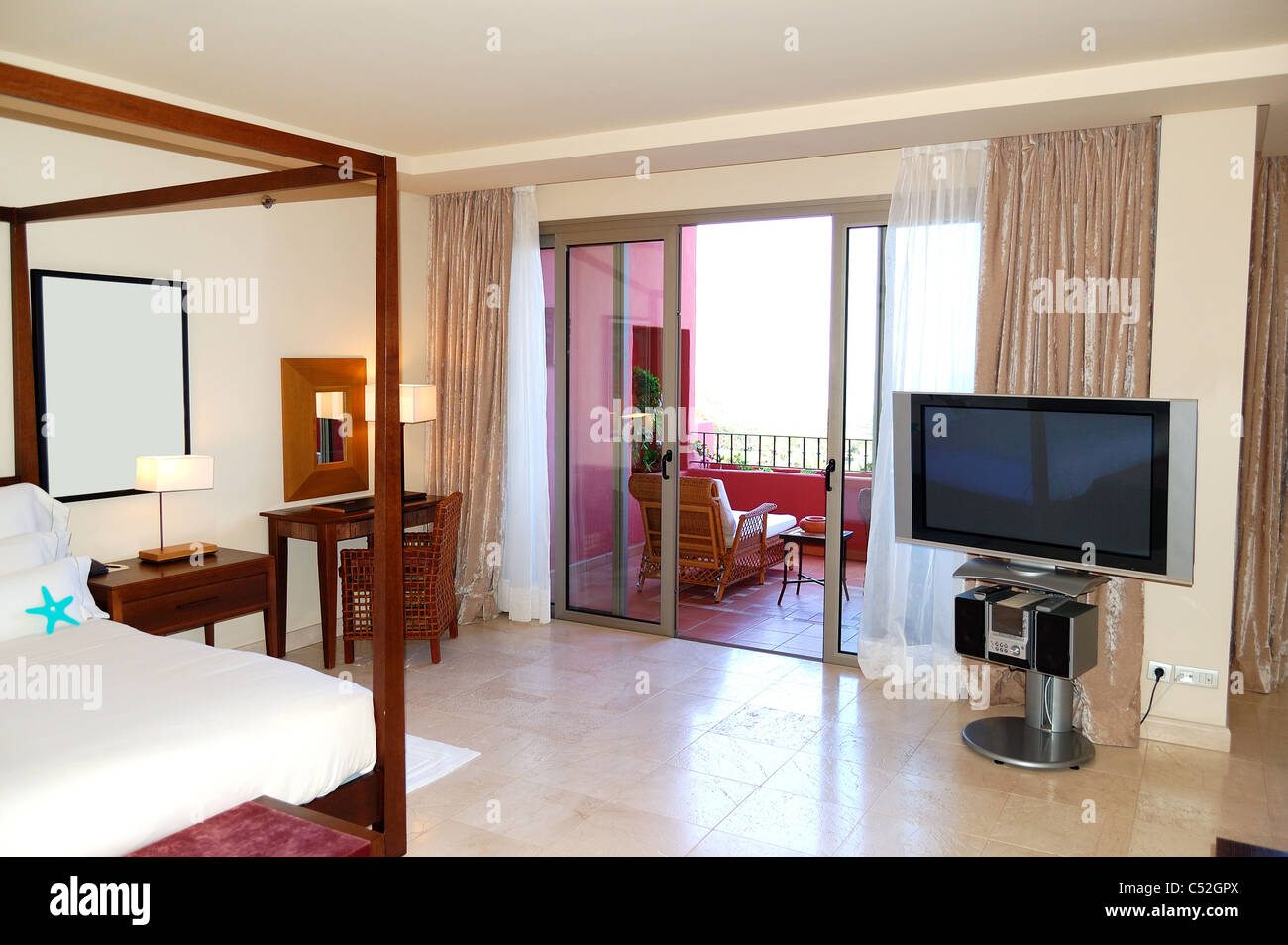 Image showcasing Apartment interior with plasma tv and balcony in the luxury hotel ...