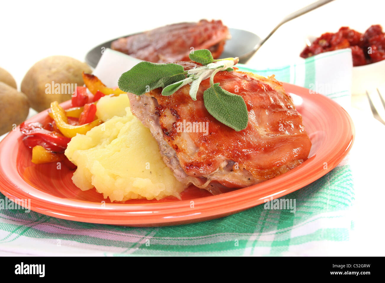 Saltimbocca of veal with bacon, sage and dried tomatoes Stock Photo Alamy