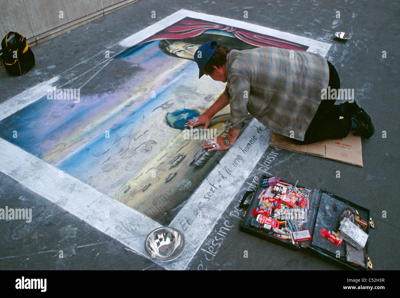 Muralist at work in Paris, France. Stock Photo