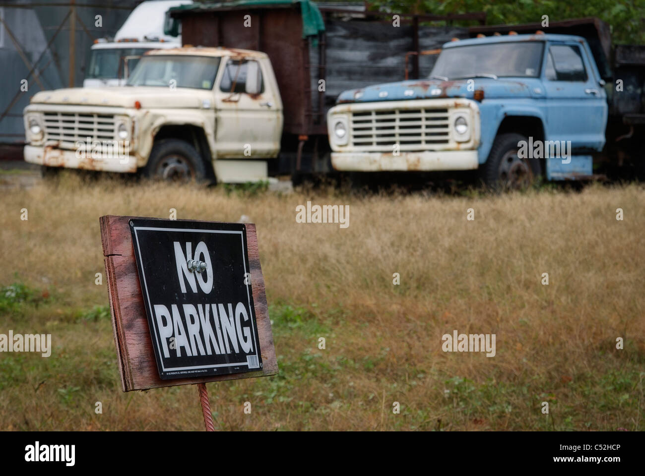 No parking sign and old trucks, Bryson City, North Carolina, USA Stock Photo
