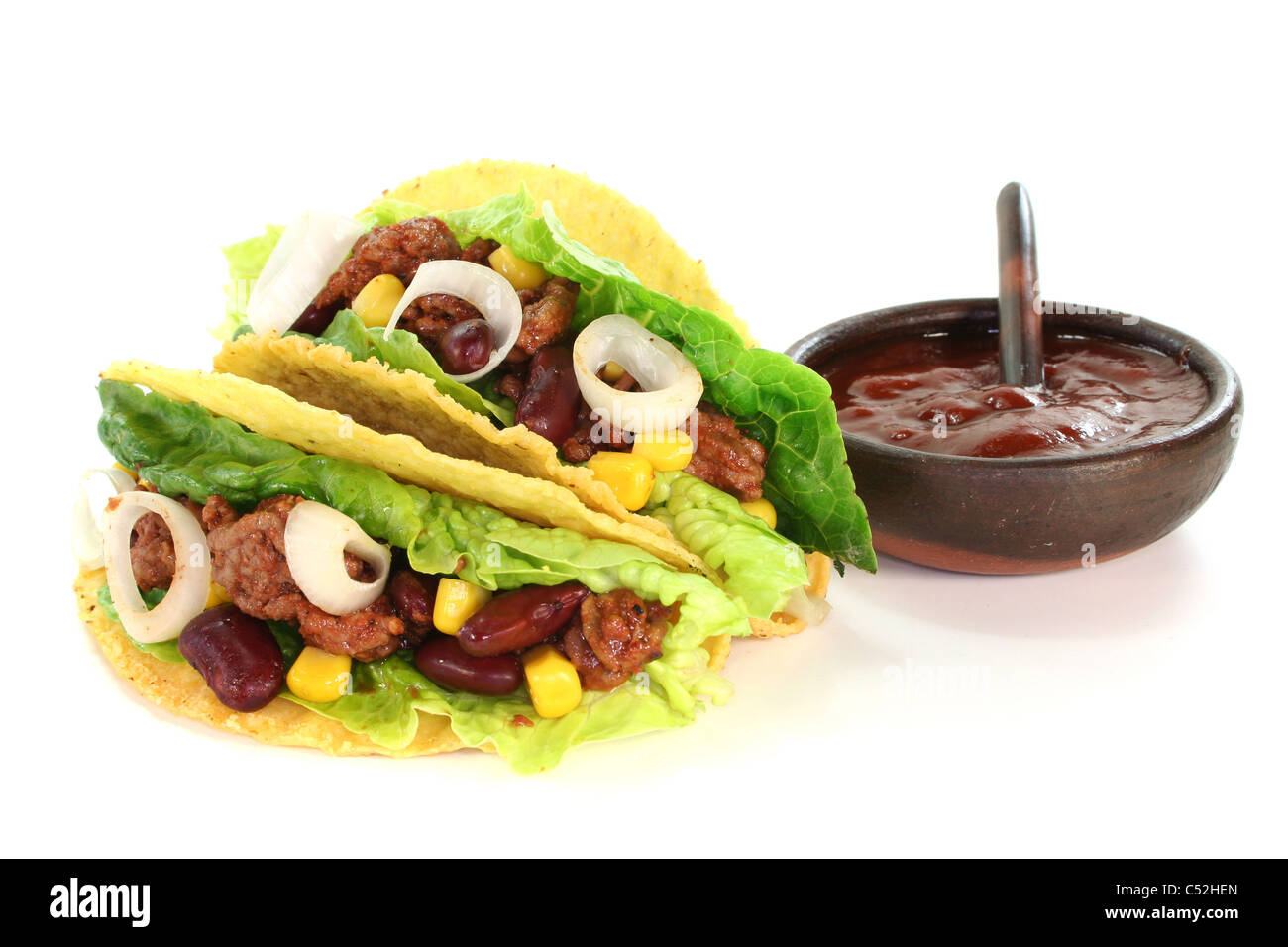 Mexican tacos with ground beef, lettuce, red kidney beans and corn on a