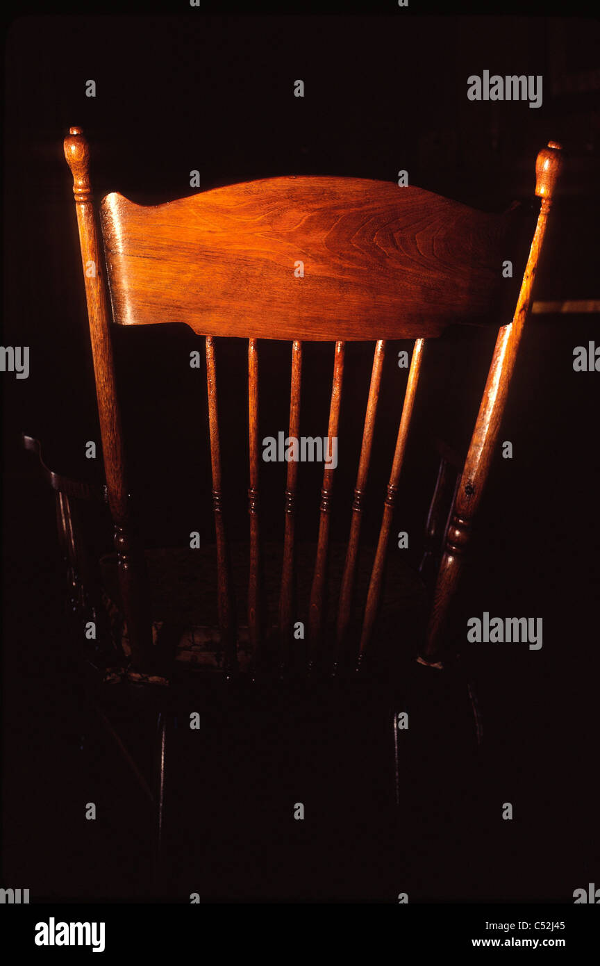 Antique oak rocking chair. Stock Photo