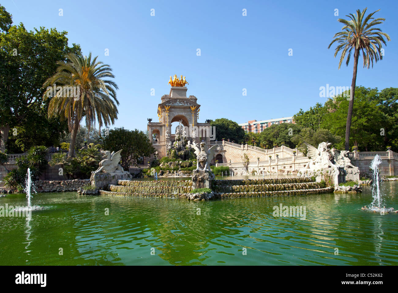 Green water, fountains and stone statues as part of a Font de la