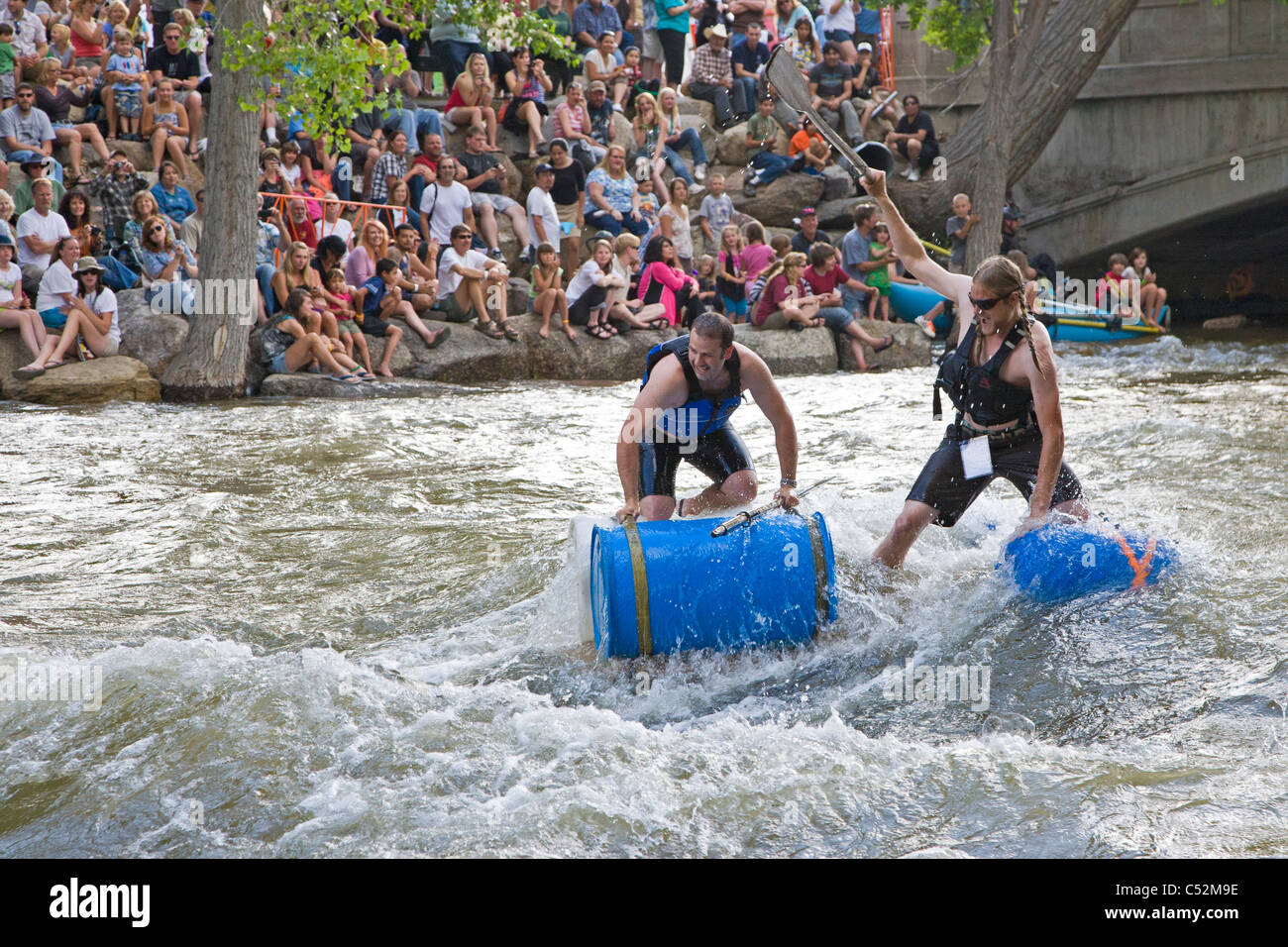 Competitors in the annual Fibark Hooligan Race float through the town ...