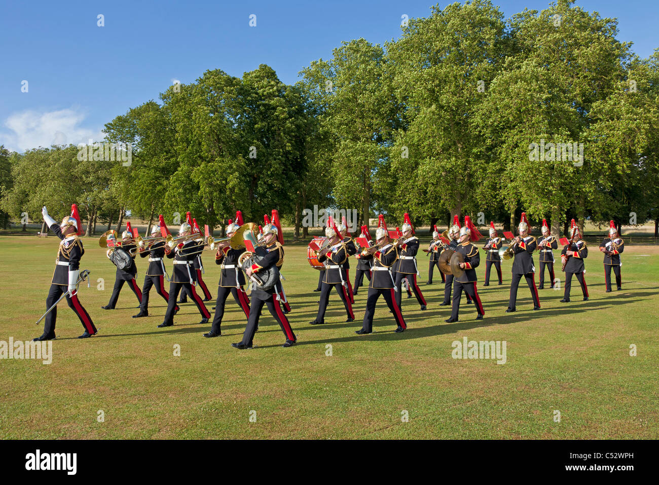 The military Band of the Blues and Royals playing and marching at a private royal function in Windsor Great Park. JMH4999 Stock Photo