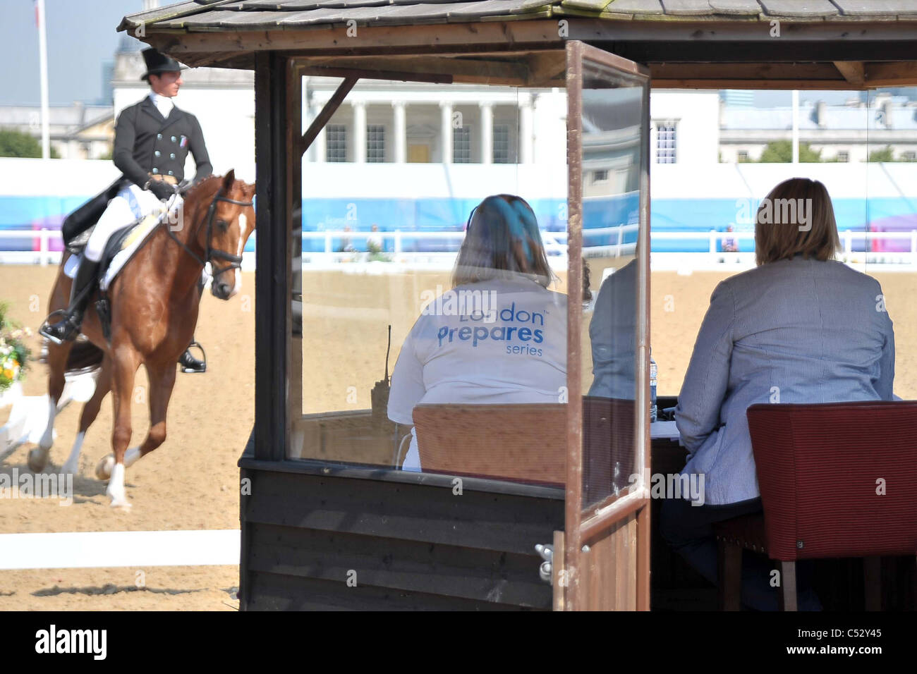 A rider goes past the judges box. Dressage. Greenwich Park Eventing