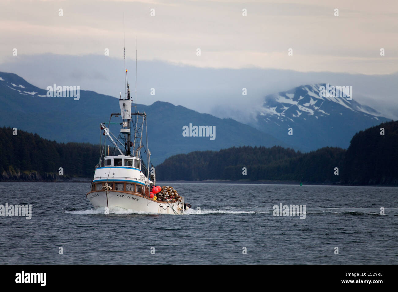 View of F/V Lady Kathryn, a salmon seiner, underway in Chiniak Bay, Kodiak, Southwest Alaska, Summer Stock Photo
