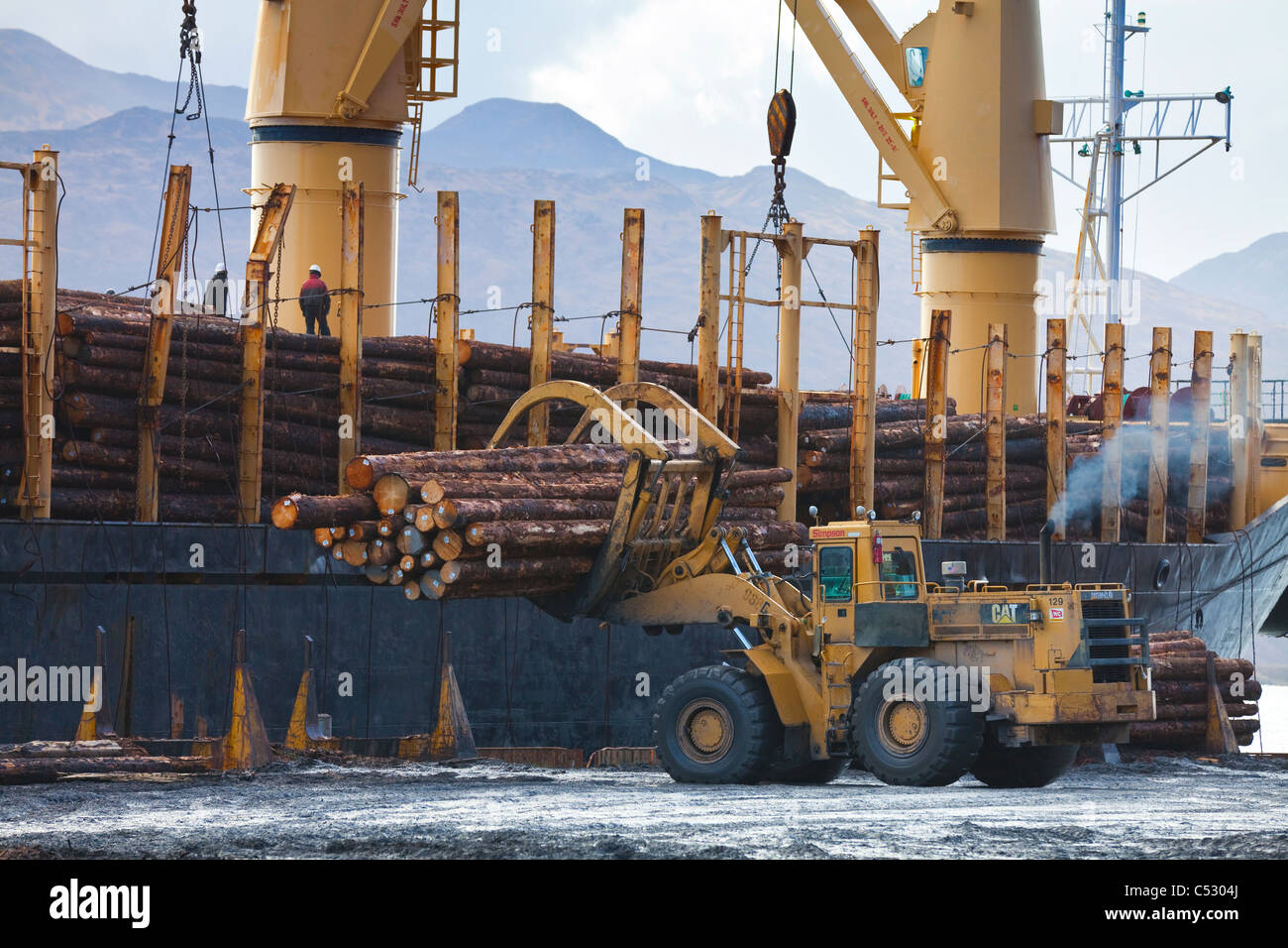 Log ship being loaded with Sitka Spruce from Chiniak and Sequel Point at LASH dock in Women's