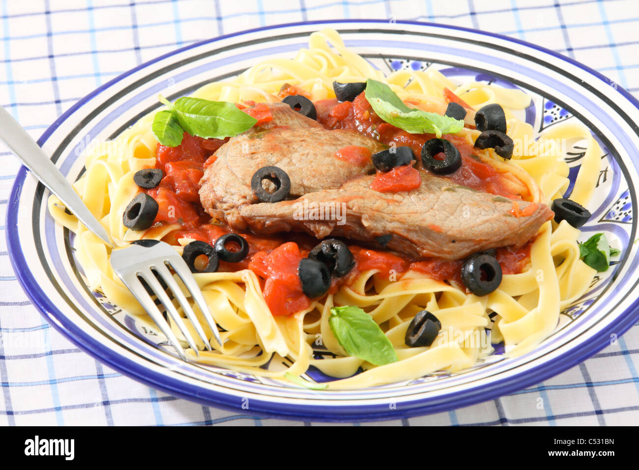A Mediterranean veal recipe, with a steak braised in tomato, red wine