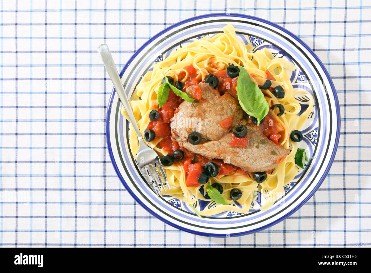 A Mediterranean veal recipe, with a steak braised in tomato, red wine