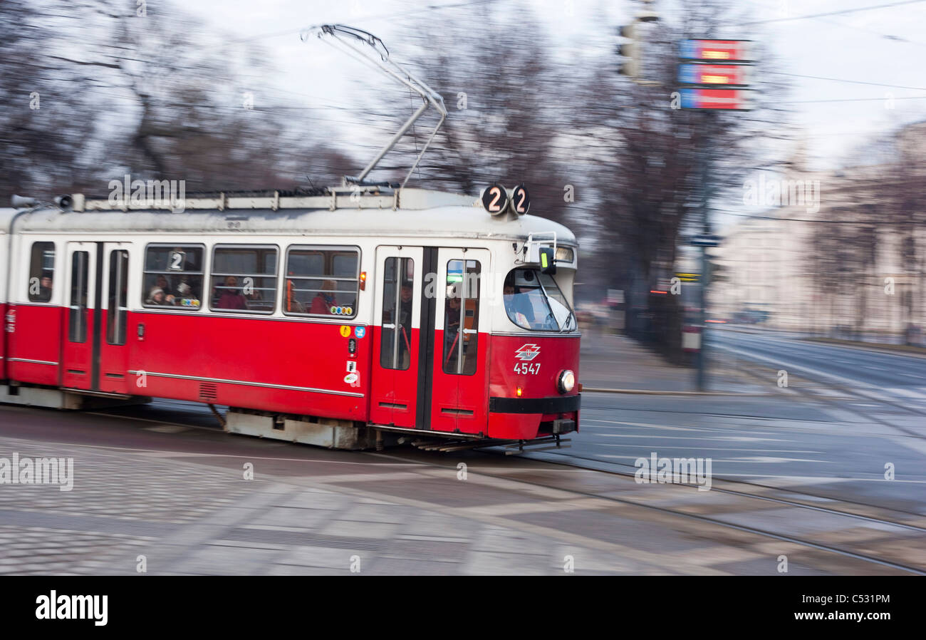 An old tram makes its journey through the city. Vienna, Austria. Stock Photo