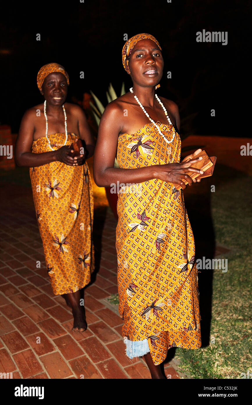 Tribal musicians and dancers perform at night in Zimbabwe. Stock Photo