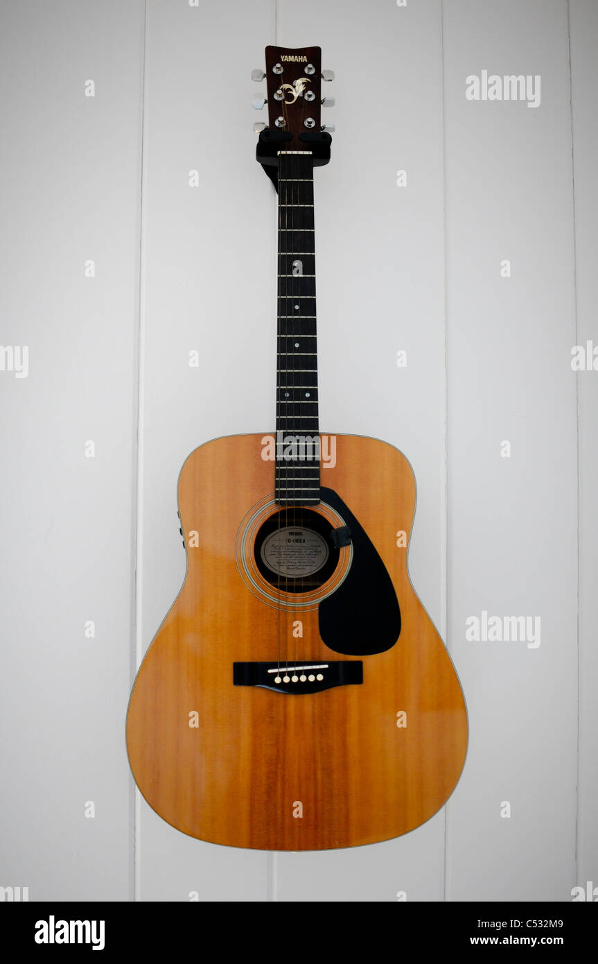 Musical instrument - View very rare vintage acoustic guitar folk country  wood and white background Stock Photo - Alamy