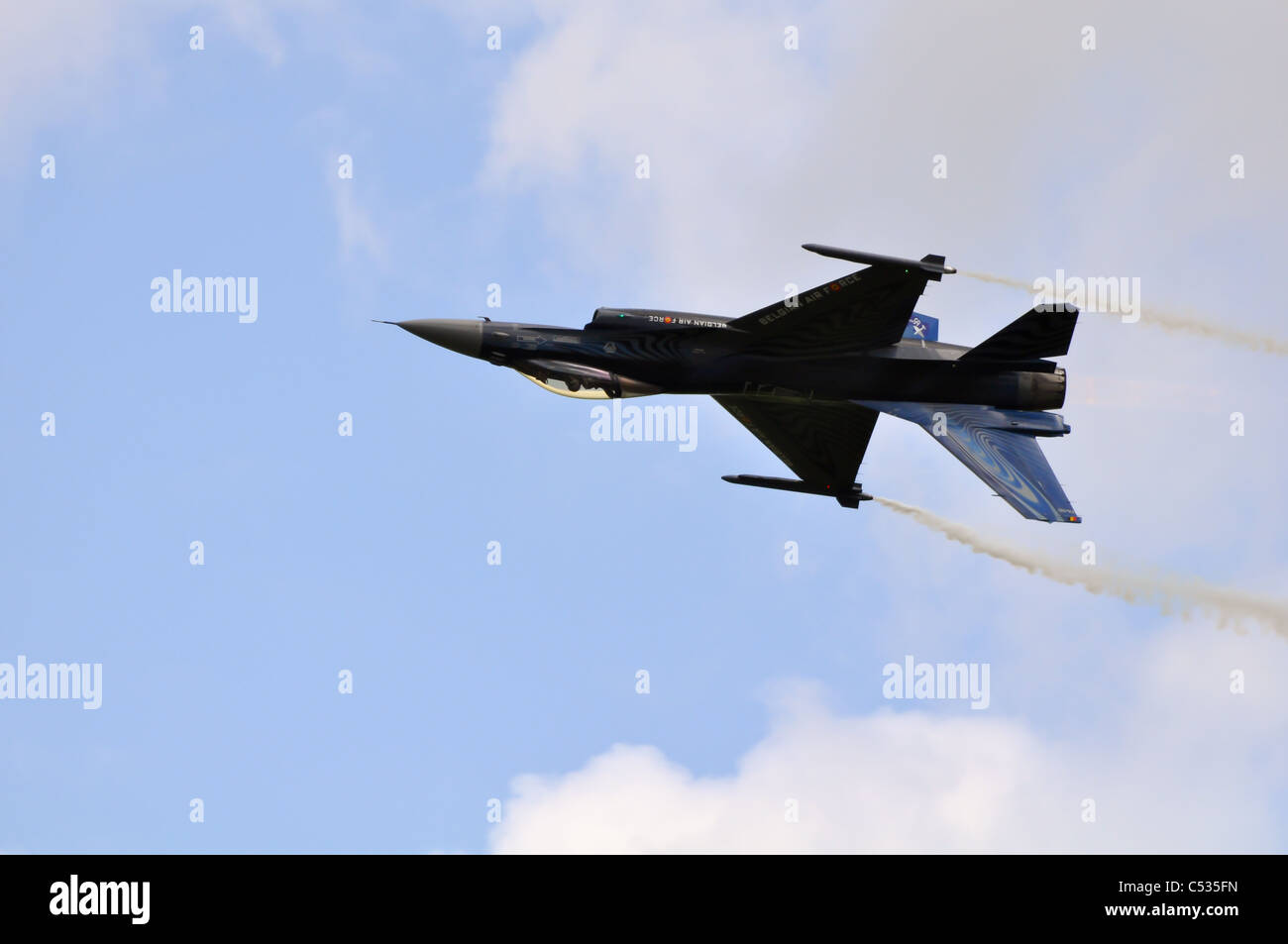 f-16 fighter jet doing aerobatics at an airshow Stock Photo