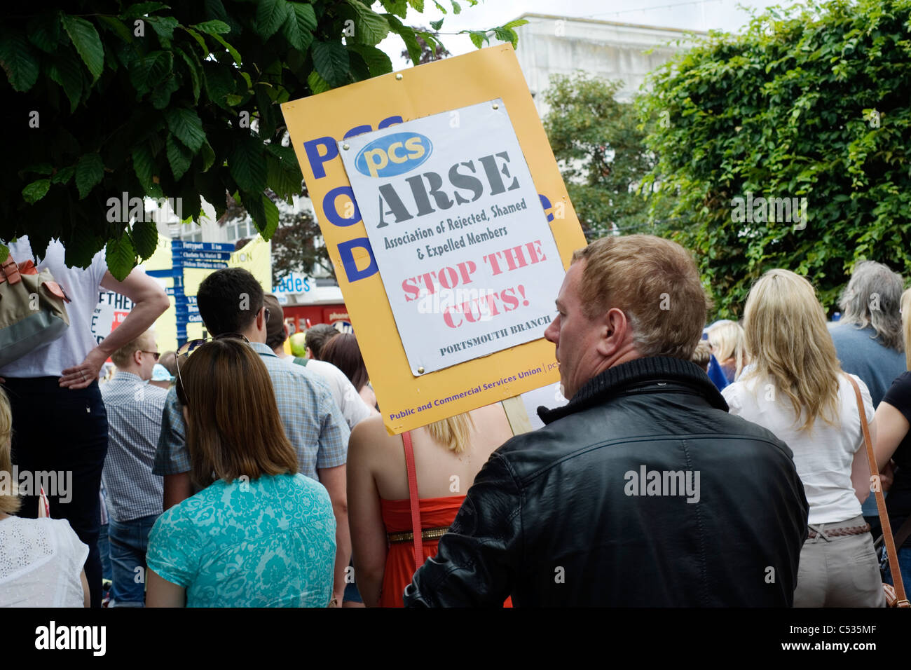 man carrying an amusing sign at a demonstration in portsmouth city ...