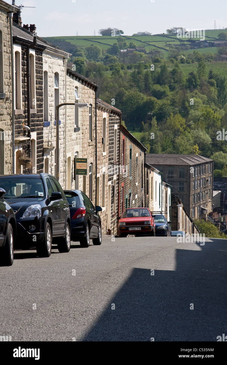 Terraced housing with Mill and open country beyond, Colne, Lancashire