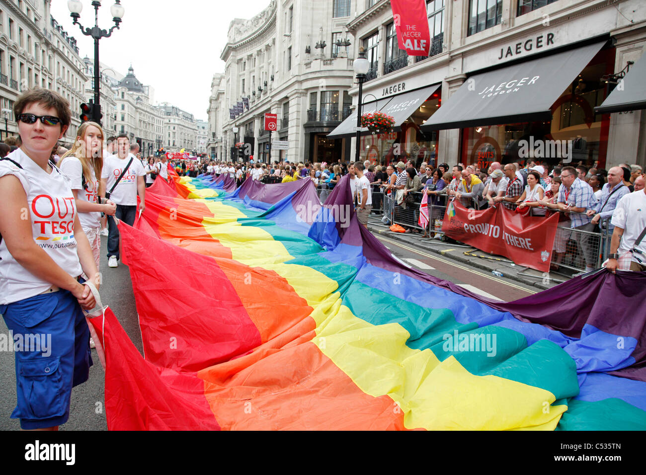 Giant rainbow flag in Regent Street in the London Gay Pride Parade 2011 Stock Photo