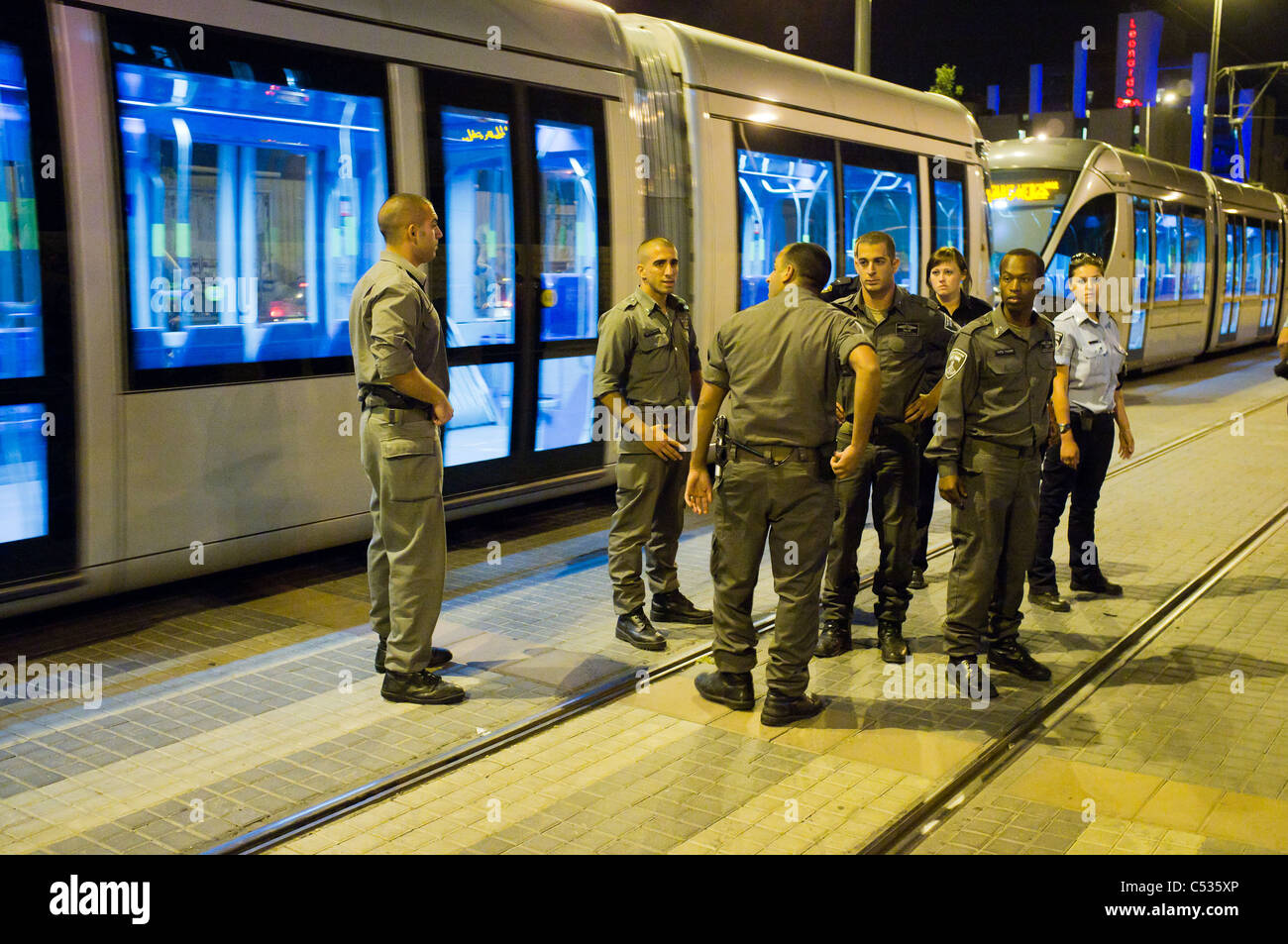 In a game of 'cat and mouse' police chase away youth blocking traffic ...