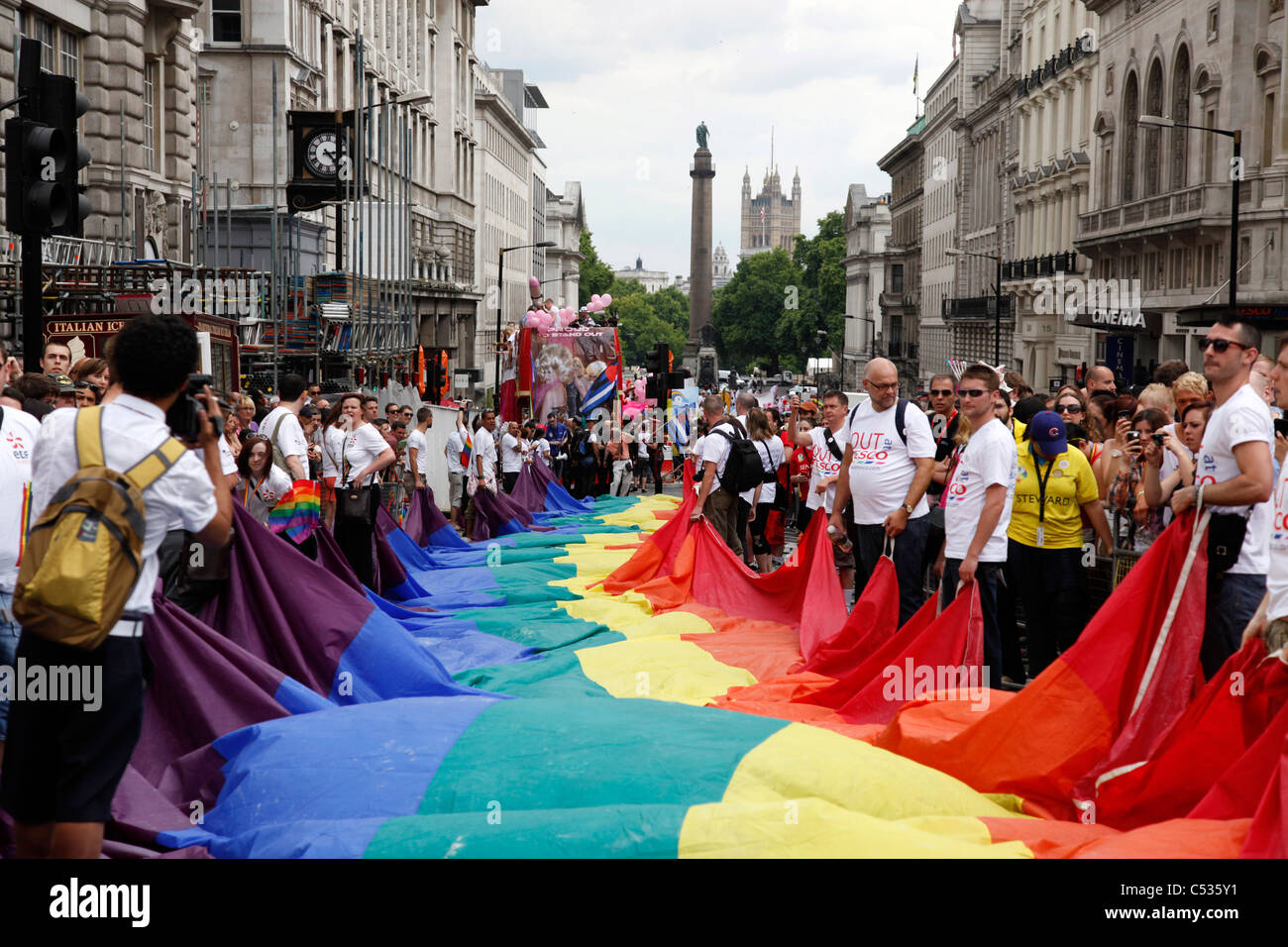 Giant rainbow flag in Regent Street at Piccadilly Circus in the London Gay Pride Parade 2011 Stock Photo