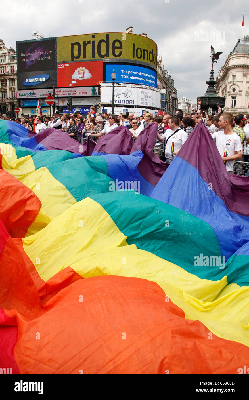 Giant rainbow flag in Regent Street at Piccadilly Circus in the London Gay Pride Parade 2011 Stock Photo