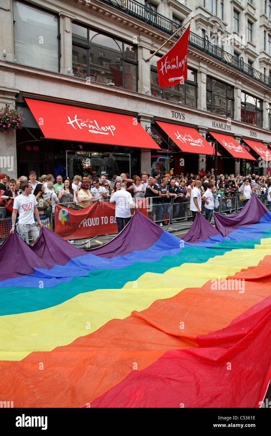 Giant rainbow flag outside Hamleys in Regent Street in the London Gay Pride Parade 2011 Stock Photo