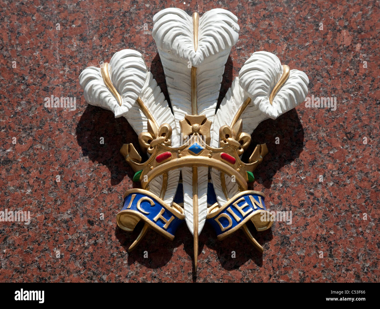 Prince of Wales's feathers and motto Ich Dien (I Serve) on Bentley & Skinner jewellers, London Stock Photo