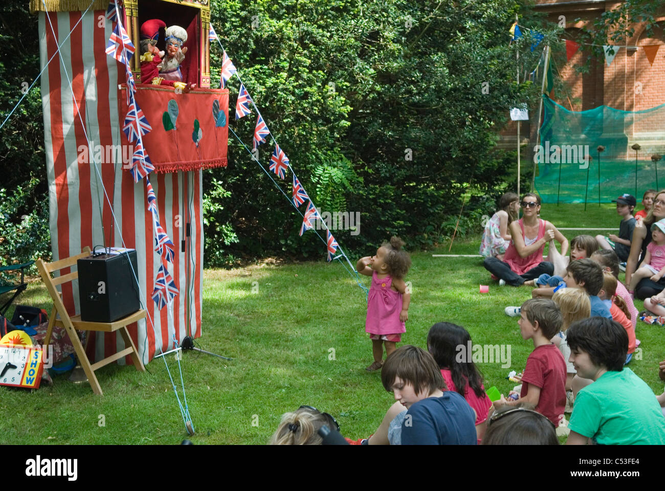 Punch and Judy Show at Petersham village fete Richmond Surrey. UK. 2011 2010s HOMER SYKES Stock Photo