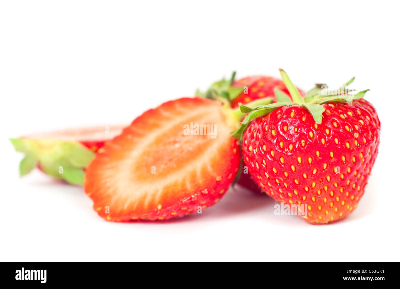 Ripe juicy strawberries isolated on white background Stock Photo - Alamy