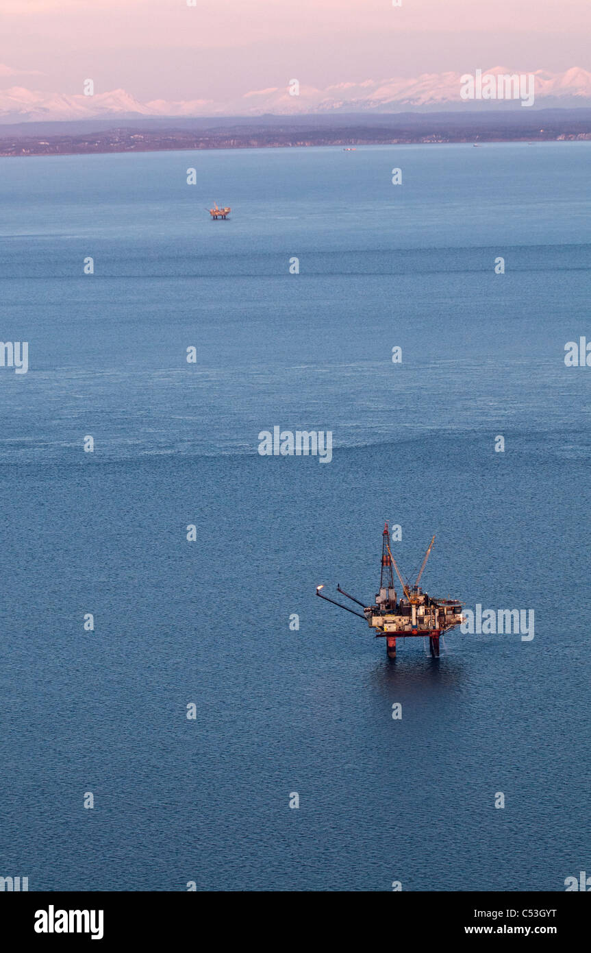 Aerial evening view of oil platform in Cook Inlet, Southcentral Alaska, Winter Stock Photo