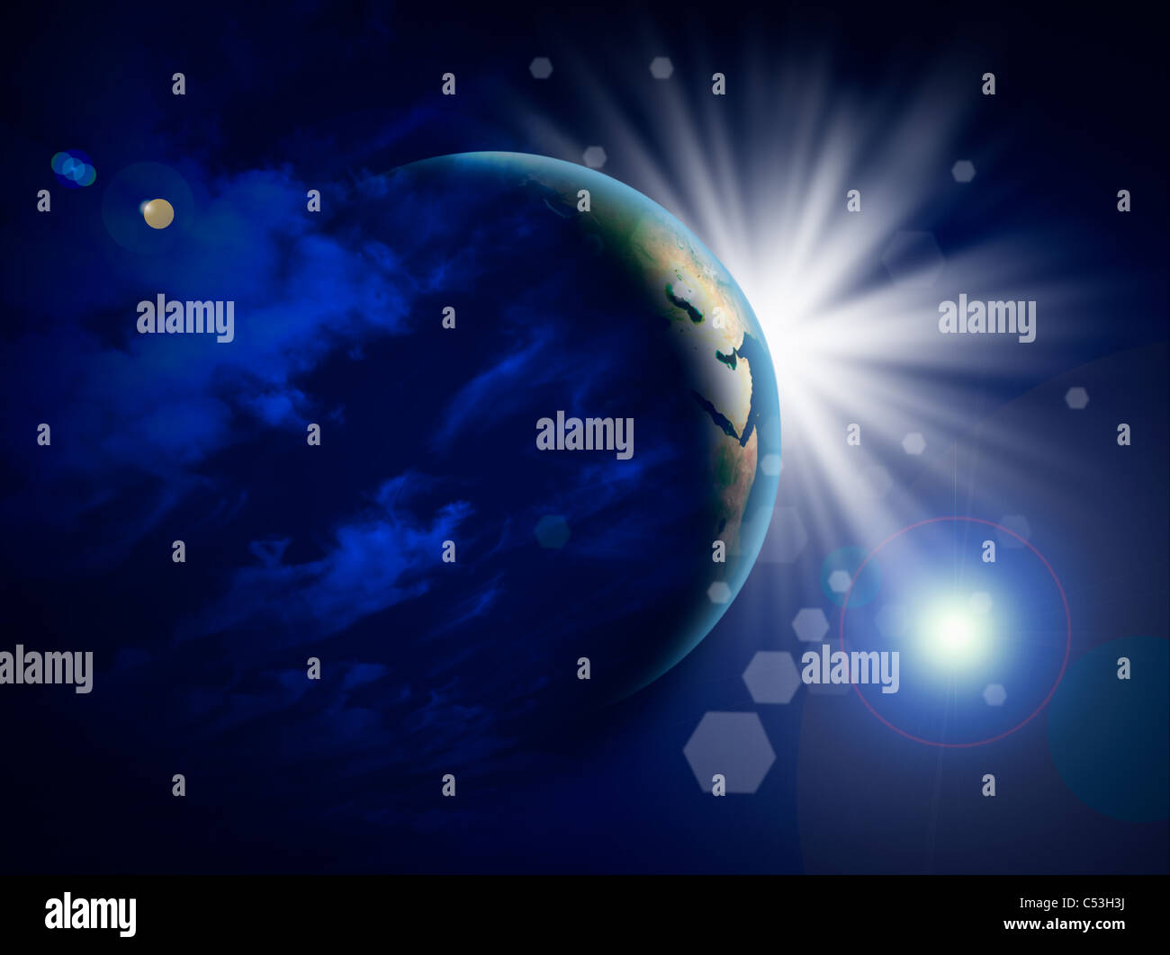 Planet earth and sunrise in the space Stock Photo - Alamy