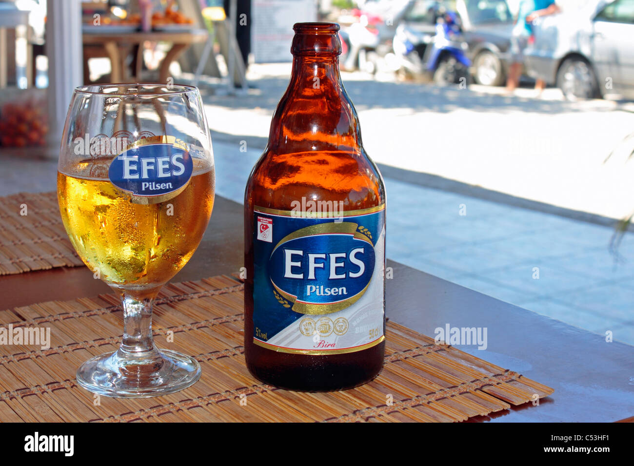 Efes Pilsen Beer Bottle and Glass on restaurant Table in Side, Turkey Stock  Photo - Alamy