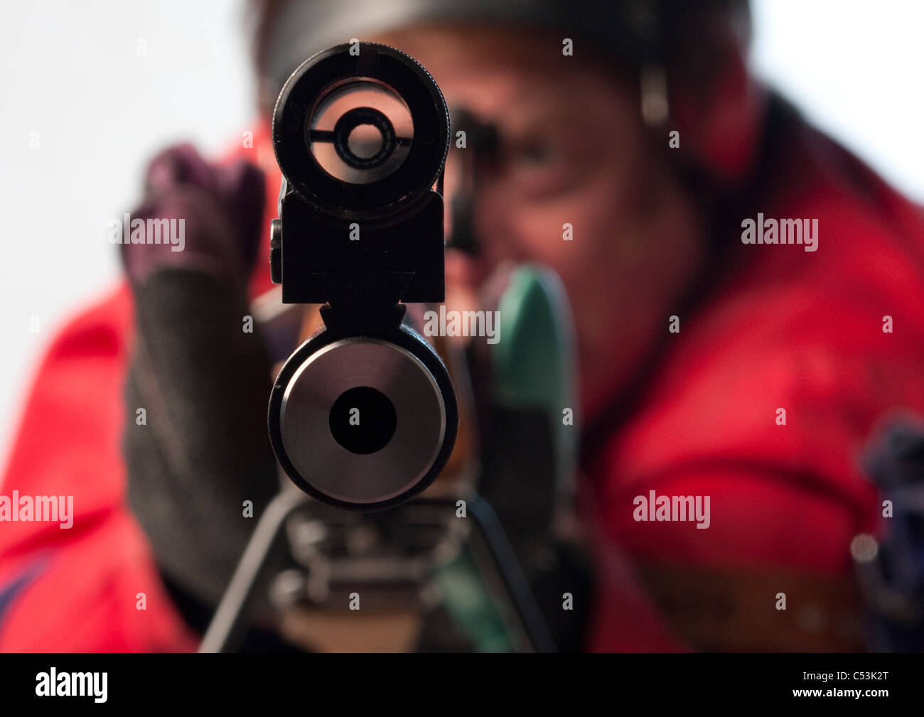 Shooter and rifle. Full bore target rifle NRA style prone position shooting Stock Photo