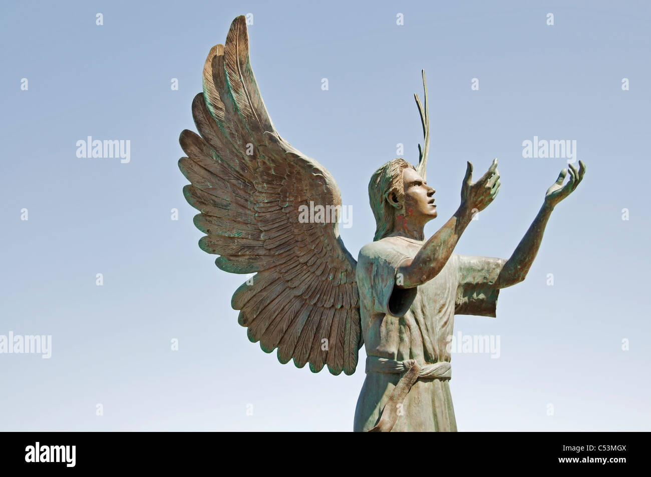 'Angel of Hope and Messenger of Peace' art sculpture on the malecon in Puerto Vallarta by artist Hector Manuel Montes Garcia. Stock Photo