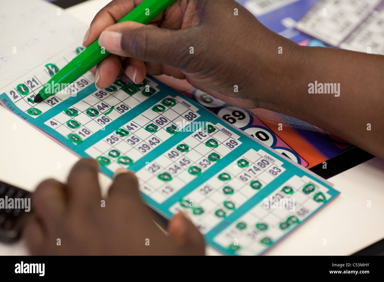 Mecca Bingo UK bingo company. People playing Bingo at Catford Bingo Hall, London, UK. Photo:Jeff Gilbert Stock Photo