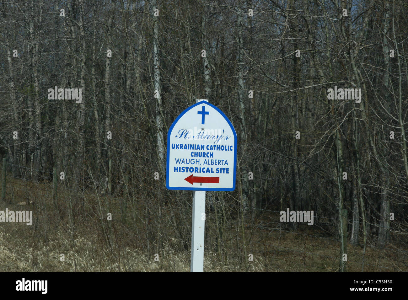 St. Mary's Ukrainian Catholic Church Waugh, Alberta, Canada historical site directional sign with red arrow Stock Photo