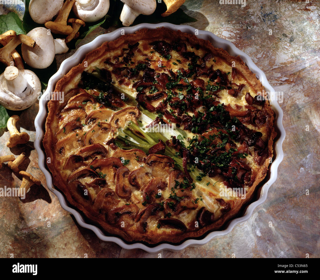 Mushroom tart with chanterelles and mushrooms Stock Photo Alamy